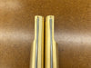 Two Rob Cosman Brass 1-inch benchdogs showing the primary and secondary faces with negative rakes